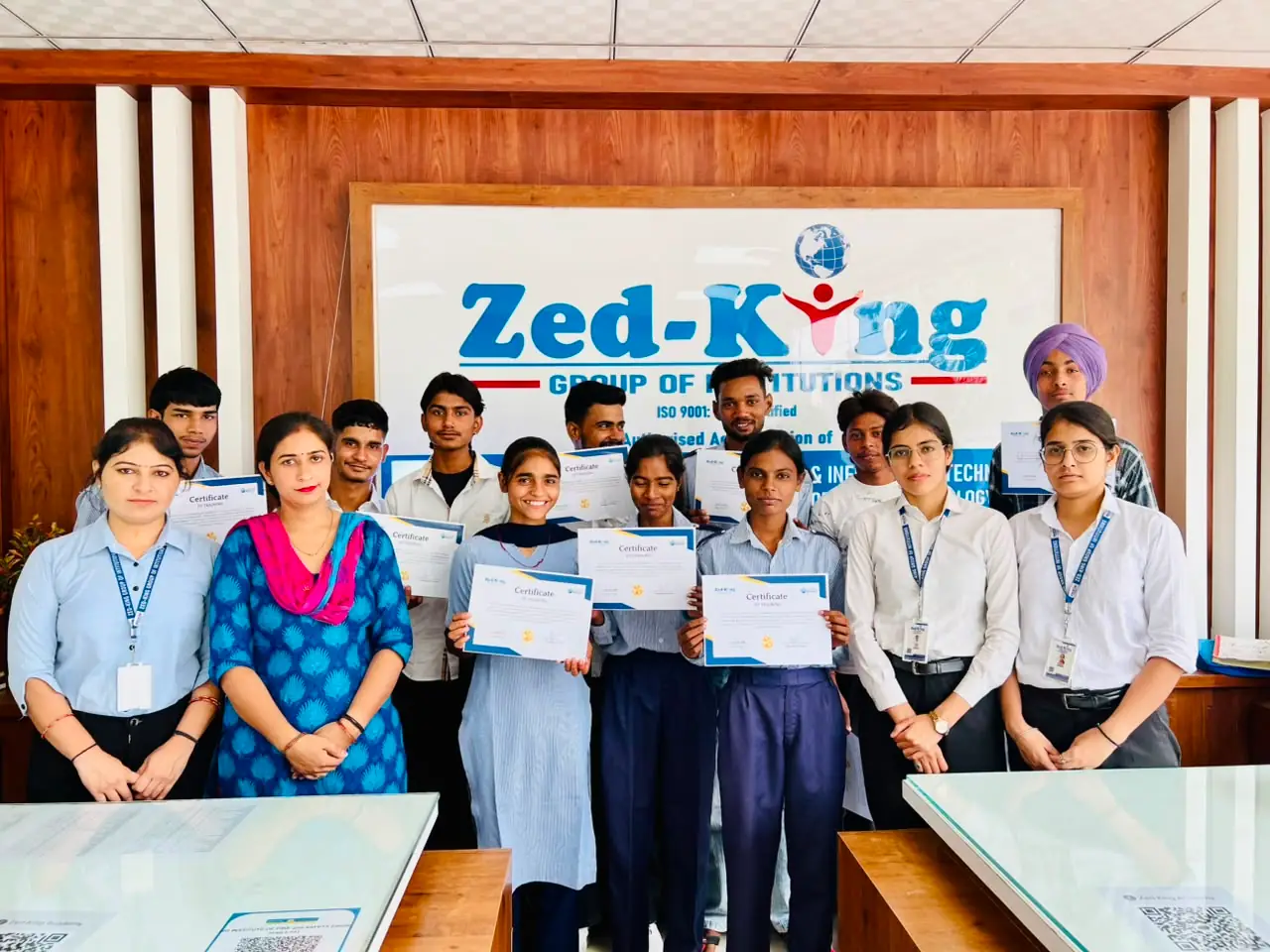 Students receiving their computer course training certificates at Zed-King Institute, Kaithal